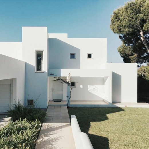 white-concrete-house-near-green-tree-during-daytime.jpg white concrete house near green tree during daytime